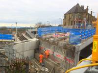 View over the parapet of the temporary footbridge as the new Station Road overbridge takes shape. When the bridge is complete there will still be much work to be done to reroute the services which have been temporarily diverted [see image 56590]. It is due to open in August 2017.<br><br>[Colin McDonald 09/02/2017]