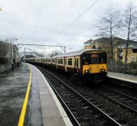 A six-car 318 in mixed livery calls at Jordan hill with a Motherwell service on 11/02/2017.<br><br>[David Panton 11/02/2017]