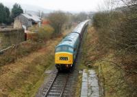 <I>Peak</I> Class 1Co-Co1 45108 passes the closed station at Ewood Bridge & Edenfield with a train from Rawtenstall on 11th February 2017. In the background the now very dilapidated goods shed can be seen, looking like the next bad storm will finish it off. <br><br>[Mark Bartlett 11/02/2017]