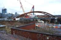 The new bridge over the River Irwell for the Ordsall Chord, seen from a train travelling between Ordsall Jct and Deal St Jct early in the morning of 25 February 2017.<br><br>[John McIntyre 25/02/2017]