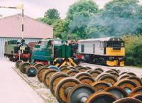I think they've got enough axles there. From the left, side tank steamer no. 1704, a Sentinel diesel shunter, 5927 Hogwarts Express [see image 47572], and 20.905 at a Works Open Day in 2005.<br><br>[Ken Strachan 17/09/2005]