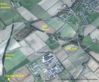 In 1942 a Government  munitions factory was opened at Charlesfield,  to the south of St Boswells, located below the 'V' formed by the Waverley route and the Kelso branch. The site was provided with a freight only rail link consisting of a spur off the Kelso branch to the east, while a quarter of a mile to the west a passenger halt was provided on the Waverley route for the benefit of factory workers. At the end of WWII Charlesfield became a Royal Naval armaments depot, remaining in military use until 1963. The site was subsequently transformed into what is today a busy industrial estate. (The last recorded use of Charlesfield Halt was in late 1959, with official closure taking place in 1961.) Imagery (c) 2016 Google and (c) 2016 DigitalGlobe. Annotations by John Furnevel.<br><br>[(c) 2016 Google and (c) 2016 DigitalGlobe 14/02/2017]