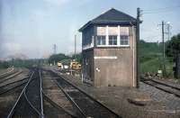 The former upper junction signal box at Greenhill, as viewed through the front windows of a Glasgow Queen Street to Dunblane DMU in June 1988. Note the sun shades on the west facing upper windows to assist the signalman’s vision. The box was demolished in 1990 after the panel had been relocated nearby. <br><br>[Mark Dufton /06/1988]