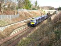 A Sunday morning service on the Borders Railway runs south through the site of the original Eskbank station on 12 March 2017. In another half mile the train will stop at its 2015 replacement. <br><br>[John Furnevel 12/03/2017]
