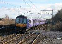 Northern 319382 has just left Euxton Balshaw Lane heading south but is held by the signal protecting Balshaw Lane Junction where the four track section of the WCML becomes two tracks. These Preston to Liverpool services had just resumed after the Lime Street cutting collapse.<br><br>[Mark Bartlett 09/03/2017]