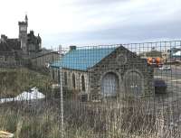 The old locomotive shed at Fraserburgh in March 2017, looking north east towards the harbour from the car park of Fraserburgh leisure centre. The building is part of a wholesale fish merchants located off South Harbour Road. [See image 38317]<br><br>[Andy Furnevel 15/03/2017]