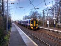 A mid-morning service for Edinburgh calls at Wester Hailes on 20/03/2017. The station opened in 1987, the same year as neighbouring Curriehill reopened.  Despite getting the same trains however Wester Hailes clocks up far fewer passengers. This is probably for socioeconomic reasons; this is not really commuter country. However footfall will surely improve with an increased service come electrification of the whole line.<br><br>[David Panton 20/03/2017]