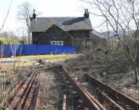The boarded up former station master's house at Beattock in March 2017. View is east with the WCML passing directly behind the camera. The station buildings themselves are long gone [see image 37674]. [Ref query 988].<br><br>[John Furnevel 27/03/2017]