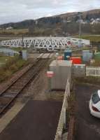 Swingtime at Banavie. A view of the Banavie Swing Bridge and Mallaig end of the station from the modern signal box. The bridge over the Caledonian Canal is swung open to allow vessels to pass.<br><br>[John Yellowlees 02/04/2017]