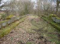 View east across the Kirkdale Viaduct, west of Kirkbymoorside, with the parapet intact complete with remains of the metal safety fencing still in situ. I was informed that the scouting organisation use the viaduct to absail down to the ground alongside the Hodge Beck. <br><br>[David Pesterfield 01/03/2017]