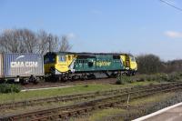 Freightliner 70010 passes eastbound through Didcot with a container train on 15 March 2017.<br><br>[Peter Todd 15/03/2017]
