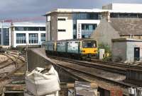 A Class 143/142 pair of Pacers about to enter Cardiff Central on the lines from Queen St on 02 September 2015 with a service to Barry Island.<br><br>[John McIntyre 02/09/2015]