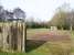 Tribute is paid to its railway heritage at the play area which is now on the site of Uddingston East station. We hope that these will be the only sleepers at the goals. The line continued (centre) north west towards Uddingston West station, whose site is NOT recommended as a play area [see image 58268]. <br><br>[Colin McDonald 24/02/2017]