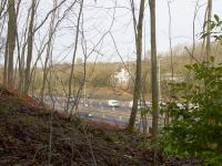 View north west towards the site of Uddingston West from where the trackbed was cut during the construction of the M74 Uddingston bypass in the mid 1960s.  <br><br>[Colin McDonald 24/02/2017]