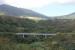 Viaduct over a ghut (valley) on the St Kitts Railway, seen from a train that had crossed it a few moments before. There are many such unfenced structures on the east coast of the island and the train often weaves around a headland then runs up a short valley before crossing one or more of these impressive bridges and heading back to the coast. <br><br>[Mark Bartlett 18/02/2017]