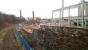 The remains of Leith Walk station looking north west towards Powderhall on 1 April 2017. On the right, development is now well underway on the site of the former Shrubhill tram depot.<br><br>[Andy Furnevel 01/04/2017]