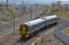 158 705 passes the site of the demolished Millerhill Depot with a Tweedbank service.<br><br>[Bill Roberton 04/04/2017]