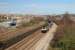 The 0745 from London Paddington to Swansea passing what was the site of Hafod Jct where the Morriston Branch diverged to the right and passed under Landore Viaduct which can be seen on the extreme right of the picture.<br><br>[Alastair McLellan 24/03/2017]