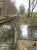 Two images of the Eden Valley Railway at Warcop. The upper view looks north west showing the railway running alongside the fence of Warcop army camp towards Appleby. The lower image looks back towards Warcop station, its approach road and the EVR preservation base on 15th April 2017.  [Ref query 997]<br><br>[Mark Bartlett 15/04/2017]