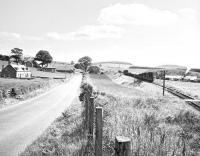 D3888 on the eastern approach to Earlston on 16 July 1965. The working is the last scheduled pickup goods train over the branch, on its way back from Greenlaw to St Boswells.<br><br>[Bruce McCartney 16/07/1965]