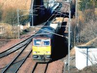 EWS 60029 <I>Clitheroe Castle</I> has just passed Newcraighall station on 23 November 2004 with a short train of empties from the STVA car terminal at Bathgate returning to Washwood Heath.<br><br>[John Furnevel 23/11/2004]