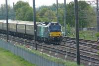 88002 with the Northern Belle charter stock, heads north approaching Farington Jct with a London to Carlisle VIP special on 09 May 2017.<br><br>[John McIntyre 09/05/2017]