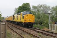 97301 (the former D6800) approaches the level crossing at Egginton Junction on 8th May 2017 hauling a measurement train from Derby towards Uttoxeter and Stoke-on-Trent.<br><br>[Mark Bartlett 08/05/2017]