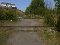 The site of the west throat of Kirkland Yard, Leven, on 11 May.  In the foreground is the long-disused line to Methil Power Station and docks.  Beyond is the demonstration track of the KFRPS depot which ends a hundred yards or so to the left.<br><br>[Bill Roberton 11/05/2017]