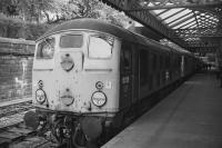 <I>Skinhead</I> BR Type 2 5015 and BRCW 5307 await departure from Edinburgh Waverley with the 'Scottish Steam Special No.3' on 8th September 1973. A4 60009 would take over from Inverkeithing.<br><br>[Bill Roberton 08/09/1973]