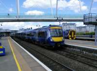 An Aberdeen to Glasgow service pulls out of Stirling on 18/05/2017. A 158<br>
is stabled at Platform 8.<br><br>[David Panton 18/05/2017]