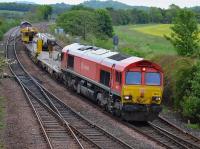 DB red 66101 leads an Elgin - Millerhill engineers train past Inverkeithing East Junction.  66050 is on the rear.  30 May.<br><br>[Bill Roberton 30/05/2017]