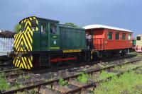 NBL 27421 of 1955, ex-RAF Leuchars No. 400, at the passenger platform with the former Norwegian State Railways guards brake van which carries visitors on the demonstration line on Summer Sundays.<br><br>[Bill Roberton 04/06/2017]