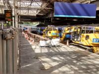 Platform 12 at Waverley has been so thoroughly ripped up that its hard to believe it is being extended rather than abolished. Meanwhile, the building behind it, which will in due course need to be demolished, is still in use.<br><br>[David Panton 12/06/2017]