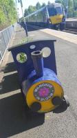 Barrel train and real train at Milngavie. [John noted there should be a plaque - an overly detailed page on the Milngavie line was the first page on RailScot. -Ed]<br><br>[John Yellowlees 18/05/2017]