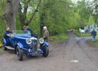 The rather rough road shown here is Brockhill Road; but between about 1910 and 1931, it was a railway of gauge approximately three feet linking Colwall Park Quarry with Colwall station (more or less). Amidst all this uncertainty, I can report with complete confidence that the rather spiffing gentleman's speedy roadster on the left is a 1937 Lagonda.<br><br>[Ken Strachan 01/05/2017]