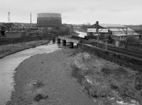 Wrecked bridge over the River Caldew on the former Carlisle Goods Line. This followed a freight train derailment, after which the line was subsequently formally closed. <br><br>[Bill Roberton //1986]