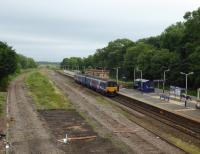 Transformation at Kirkham. All traffic is presently concentrated on the two platform lines as the fast lines were recently lifted. A third platform is planned here as part of the electrification work. 150150 calls on a Blackpool North to Manchester service on 16th June 2017. [See image 22070] for an earlier view from the same vantage point.<br><br>[Mark Bartlett 16/06/2017]