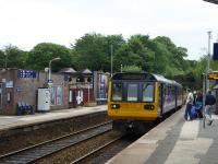 Northern Pacer 142056, working from New Mills Central to Manchester Piccadilly, pulls in to the first stop at Marple on 16th June 2017. These South Manchester services were the last refuge of the 1st Generation Met-Cam DMUs [See image 12896] but then went over to Pacer operation. What will be cascaded next? <br><br>[Mark Bartlett 16/06/2017]