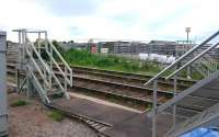 Stairs by the East box at Forres on 21 June 2017. On the right are the signal box access steps, to the left those for catching tablets from westbound trains, with the equivalent for eastbound trains across the tracks. In the background are the works associated with the new station and loop.<br><br>[Alan Cormack 21/06/2017]