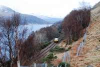 A Network Rail landrover heads south alongside Loch Treig in 2013. This may have been to check on the condition of the derailed locomotive, about a mile further south.<br><br>[Ewan Crawford 12/02/2013]