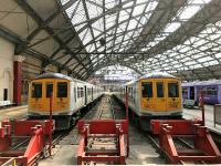 Northern Class 319 nos. 367 and 361, still in their white base livery with blue doors, seen at Lime Street's Platforms 1 and 2 in June 2017.<br><br>[Colin McDonald 20/06/2017]