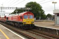 DBS 66136, westbound through Didcot with a rake of stone empties bound for the Somerset Quarries on 15th June 2017. This engine hauled the first London to China freight train recently.<br>
<br><br>[Peter Todd 15/06/2017]