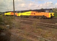 Colas Rail 70.807 and a classmate bask in the sun at Westbury. The livery may be bright, but it doesn't actually make up for the (lack of) styling.<br><br>[Ken Strachan 13/05/2017]
