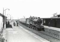 A Saturday Darvel - Ayr train, hauled by 2P 4-4-0 40645, arrives at Newton-on-Ayr on 4 July 1959.  <br><br>[G H Robin collection by courtesy of the Mitchell Library, Glasgow 04/07/1959]