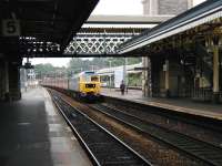 A terminating Virgin Cross Country service from Manchester Piccadilly runs into platform 4 at Exeter St Davids during the afternoon of 6 June 2002.<br><br>[Ian Dinmore 06/06/2002]