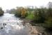 View east along the River Dee, just over a mile north of Kirkcudbright in 2005, with the remains of Tongland Viaduct on the right and Tongland power station in the background. For the north<br>
 side viaduct remains [see image 6001]. <br><br>[John Furnevel 18/11/2005]