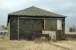 This was the main goods shed (and later tamper shed) at Stranraer Town, looking towards the station in 2006 [See image 59353].<br><br>[Colin Miller 27/03/2006]