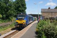 The Branch Line Society's Cat and Dock railtour around parts of the north-west took place on 15 June 2017. The tour used the stock being used for the Three Peaks Challenge later that day and subsequent two days. The BLS tour is seen on the 'outward' leg of their trip from Stafford to Ormskirk as 68026 passes Croston with the 11 coach train, quite unusual as it normally sees a 2 car DMU. <br><br>[John McIntyre 15/06/2017]