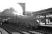 The 9.30am ex-London St Pancras stands in the shadows at Carlisle's platform 3 on a sunny Saturday afternoon in August 1963. Jubilee 4-6-0 45562 <I>Alberta</I> had taken over the train at Leeds City and is now preparing to set off on the final stage of the journey north to Glasgow St Enoch.<br><br>[K A Gray 24/08/1963]