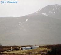 A passenger train approaches Forsinard from the south.<br><br>[Ewan Crawford //]